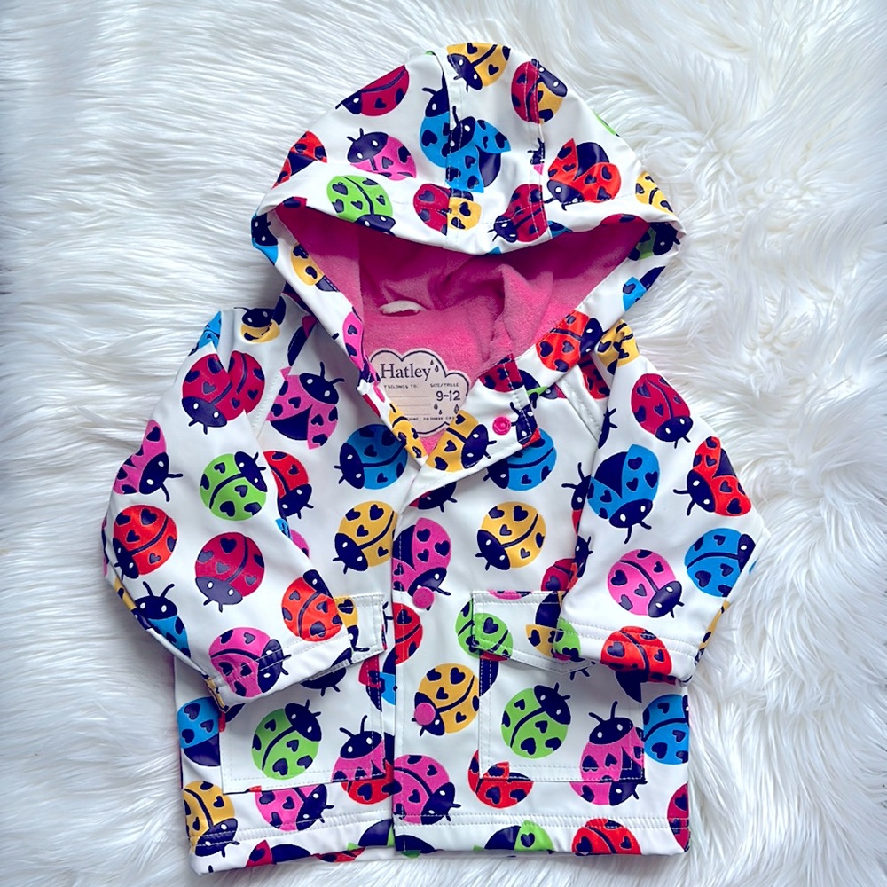 Hatley rain jacket with lady bug print and terry cloth lining.
